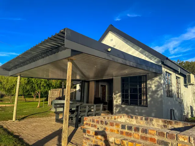 The covered patio and outdoor table