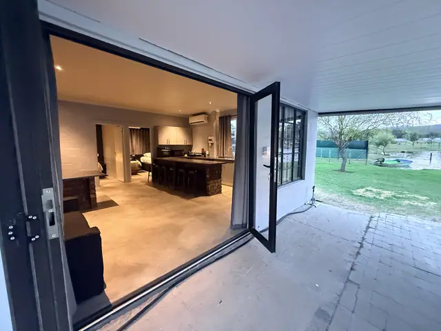 Stacking doors open straight onto the lawn