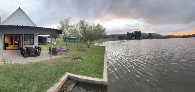 The Damhouse seen from across the water
