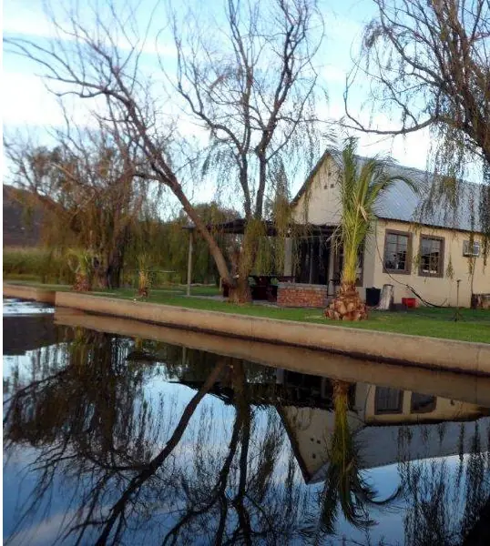 Still water in front of the houses