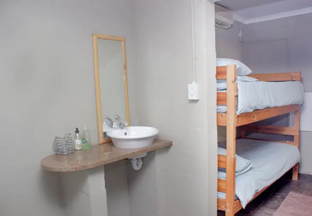 Lotz-Inn, main bedroom bathroom and bunk beds