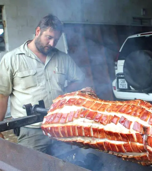 A pork spit on the fire